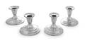 A Set Four American Silver Candlesticks
