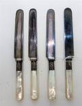 A Set of Twelve SilverPlate and Mother of Pearl Dinner Knives