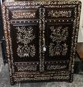 A Chinese MotherofPearl Inlaid Hardwood Cabinet