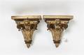 A Pair of Parcel Gilt Wall Brackets