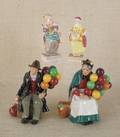 Two Royal Doulton porcelain figures including  The Old Balloon Seller