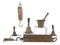 Three spring scales together with three brass school bells and a mortar and pestle