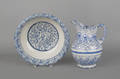 Blue and white spongeware pitcher and bowl