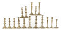 Four pairs of brass candlesticks