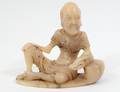 CHINESE CARVED SOAPSTONE SEATED LOHAN