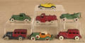 Seven cast iron toy vehicles