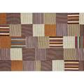 Strip woven and pieced rug