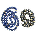 Two strands of lapis or onyx  yellow gold beads