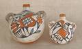 Two Acoma pottery canteens