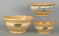 Three yelloware mochaware mixing bowls