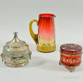Amberina Glass Pitcher an Enameled Cranberry Glass Dresser Box and a Silverplated Victorian Butter Dish with Pressed Glass Insert