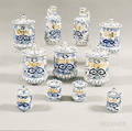 Set of Eleven Blue and White Ceramic Canisters and Cruets