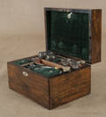 Walnut fitted sewing box with a variety of sewing accessories
