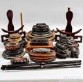 Twentynine Asian Wooden Stands and a Pair of Scroll Rods