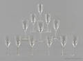 Twelve Lalique clear and frosted wine glasses in the angel pattern