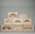 Eight Early Handcolored and Engraved Fan Decorations