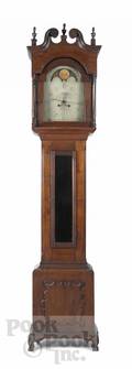 Pennsylvania Chippendale walnut tall case clock with a broken arch bonnet