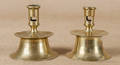 Two brass capstan candlesticks 17th c