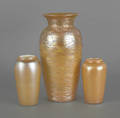 Three gold iridescent art glass vases
