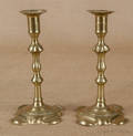 Pair of English Queen Anne brass petal base candlesticks ca 1760