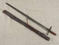 Continental steel sword with primitive leather scabbard