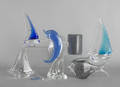 Two Murano glass sailboats together with a Daum crystal sailboat