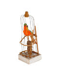Composition parrot squeak toy in cage