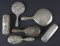 Four silver mounted brushes