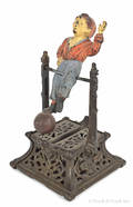 Cast iron Boy on Trapeze mechanical bank manufactured by J Barton  Smith Company