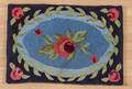 Hooked rug with rose blossoms