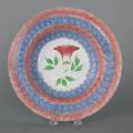 Red and blue spatter shallow bowl with cockscomb decoration 19th c