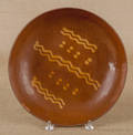 Pennsylvania redware charger 19th c