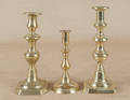 Three English brass candlesticks