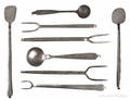 Eight whitesmithed utensils 19th c