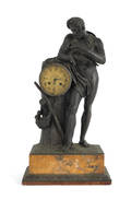 Bronze figural clock depicting a man feeding an infant on a marble base