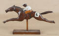Carved and painted mahogany horse and jockey