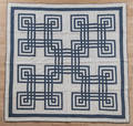 Pieced geometric quilt