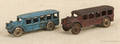 Two cast iron buses