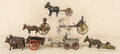 Six cast iron horse drawn toys