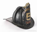 Painted leather fire helmet dated
