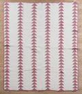 Pieced flying geese pattern quilt