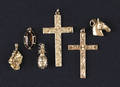 Grouping of six 14K yellow gold charms