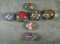 Seven assorted glass paperweights