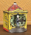 Cast iron  Halls Liliput  mechanical bank manufactured by J  E Stevens Company