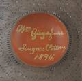 Bucks County Pennsylvania redware charger by Simon Singer dated
