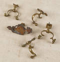 Four brass jamb hooks