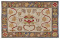 Hooked rug with a central tulip and heart 20th c
