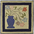 Hooked rug of a potted flower 20th c