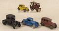 Five cast iron vehicles