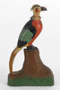 Carved and painted bird